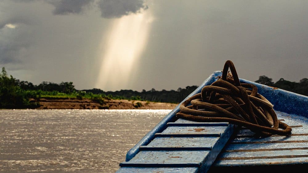 Tambopata National Reserve, boat ride along the Amazonian river at sunset